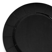 A close-up image of a Black Round Disposable Paper Charger Plate (13") showcases its sleek, modern look, featuring a textured, ridged design around the edges. The plate's surface appears smooth with a subtle glossy finish.