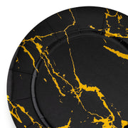 The Black with Gold Marble Round Disposable Paper Charger Plates (13") by Kaya Collection feature an elegant design with a gold marble pattern around the outer edges. These round black paper plates have textured lines and a glossy finish, combining sophistication with modern appeal. The gold streaks create an eye-catching contrast against the black background.