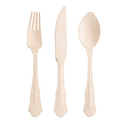 The Silhouette Birch Wood Eco Friendly Disposable Wooden Cutlery Set by Kaya Collection is displayed against a white background. From left to right, the set includes a four-tined fork, a serrated knife, and a spoon. Each utensil features slightly ornate handle designs that provide a classic look. These compostable utensils are ideal for eco-friendly dining.