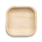 Product: Kaya Collection's Square Palm Leaf Eco Friendly Disposable Pastry Plates (4")
Description: A square, eco-friendly disposable plate created from natural palm leaves. The plate features a smooth texture with visible wood grain patterns, rounded corners, and slightly raised edges. It is showcased against a plain white background.