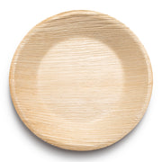 A round, light brown bowl from the Kaya Collection with a textured, wood-like appearance is centered against a white background. The bowl has a simple, natural design, underscoring its eco-friendly and rustic qualities as part of the Round Palm Leaf Eco Friendly Disposable Soup Bowls (13 oz.) collection of biodegradable party supplies.