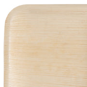 Close-up of the top left corner of a Square Palm Leaf Eco-Friendly Disposable Appetizer/Salad Plate (7"). It has a smooth, slightly curved edge and a subtle grain pattern running horizontally across its surface, making it an environmentally friendly alternative to traditional disposable plates.