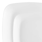 Two overlapping plates from the Solid White Flat Rounded Square Disposable Plastic Dinnerware Value Set are displayed against a white background. The smooth, rounded edges of this disposable plastic dinnerware add a touch of sophistication, making it perfect for any occasion.