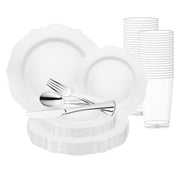 The White with Silver Rim Round Blossom Disposable Plastic Wedding Value Set is a BPA-free disposable party set designed to serve 120 guests. It includes white plastic dinnerware with plates of various sizes, neatly stacked cups on the right, and an array of elegantly placed utensils—forks, spoons, and knives—at the center. Perfect for any occasion with its simple yet stylish design.