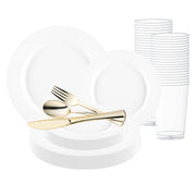 The Matte Milk White Round Disposable Plastic Wedding Value Set by Smarty Had A Party includes a set of white disposable plates in various sizes, arranged neatly in a stack. The set is accompanied by gold-colored plastic cutlery, including forks, knives, and spoons. In the background, clear BPA-free plastic cups are stacked in a column. This elegant service for 20 is perfect for any gathering.