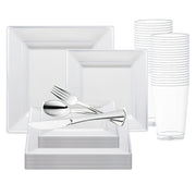 Introducing the White with Silver Square Edge Rim Plastic Wedding Value Set, ideal for party use. The set includes elegantly stacked white square plates, clear plastic cups arranged in two tall stacks, and silver plastic flatware featuring a knife, fork, and spoon conveniently placed on top of the plates.