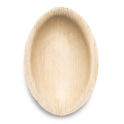 A close-up of an Ellipse Palm Leaf Eco Friendly Disposable Mini Plate (3.5"). The round, shallow, beige plate has a smooth interior and a textured exterior that highlights the natural palm leaf grain. Set against a clean, white background, the eco-friendly plate is empty and ready for use.