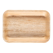 The Kaya Collection 14" x 10" Rectangular Natural Palm Leaf Eco-Friendly Disposable Trays are biodegradable plates featuring a textured wood grain pattern that provides a rustic, earthy appearance. These compostable trays also have slightly raised edges and rounded corners.