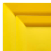 Close-up of the Yellow Square Plastic Dinnerware Value Set by Kaya Collection, featuring two square, yellow plates, with one slightly smaller than the other and overlapping at the corners. These disposable dinnerware pieces boast smooth surfaces and sharp angles, making them perfect for minimalist and modern design at a single party use.