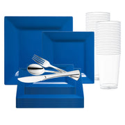 The Midnight Blue Square Plastic Wedding Value Set by Smarty had a party includes two blue square plates, one smaller blue square plate, a stacked set of transparent plastic cups, and silver cutlery consisting of a fork, spoon, and knife placed on top of the plates—ideal for an elegant yet disposable service for 20.