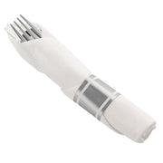 A neatly rolled white napkin holds an elegant set of silver plastic cutlery, including a fork, knife, and spoon. The napkin is secured with one of the paper rings from the Silver Plastic Cutlery in White Napkin Rolls Set, which includes 10 napkins, 10 forks, 10 knives, 10 spoons, and 10 gray-and-white striped paper rings.