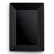 The Kaya Collection offers a stylish set of 11" x 16" Black Rectangular with Groove Rim Plastic Serving Trays, designed to nest inside each other, decreasing in size from the largest on the outside to the smallest on the inside. These trays feature smooth, glossy surfaces and rounded corners, adding a modern touch to any setting.