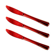 Three identical Shiny Metallic Red Plastic Knives from Kaya Collection are aligned horizontally on a white background. Each BPA-free knife has a glossy, reflective surface with a slightly rounded handle and a serrated edge on one side of the blade.