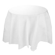 A round table covered with White Octy Round Linen-Like Tablecloths from Creative Converting drapes elegantly over the edges, creating a simple yet sophisticated appearance. The background is plain and unobtrusive, emphasizing the smooth texture of these convenient disposable tablecloths, perfect for a wedding reception.