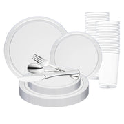 A collection of the Clear Flat Round Disposable Plastic Wedding Value Set by Smarty had a party, including plates, cups, forks, knives, and spoons, is displayed. The set features a neat arrangement with a stack of small and large plates, a group of cups aligned vertically, and utensils placed across the plates. Perfect party supplies!