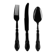 A set of three elegant black cutlery pieces, including a fork, knife, and spoon, arranged vertically side by side. Each utensil has intricately detailed handles with a beaded design, making them perfect baroque design utensils for any occasion. These are from the Kaya Collection's Black Baroque Disposable Plastic Cutlery Set, which includes 20 spoons, 20 forks, and 20 knives.