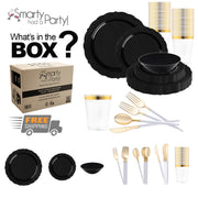 Image displaying the Black Vintage Disposable Plastic Tableware Set from Smarty. The set includes black dinner plates, salad plates, bowls, gold and white utensils, clear plastic cups with gold rims, and a cardboard box labeled "Smarty had a Party!" with icons indicating "Free Shipping" and recyclable material.