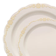 A close-up image of two elegant plates from the "Ivory with Gold Vintage Rim Round Disposable Plastic Dinnerware Value Set" by Kaya Collection. The plates, featuring an ivory base with an ornate gold rim, boast intricate patterns along the border that contribute to their classic and sophisticated look. Their scalloped edges enhance the delicate design. These dinnerware pieces are BPA-free and disposable.