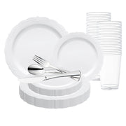 An arrangement from Smarty had a party's White with Silver Vintage Rim Round Disposable Plastic Wedding Value Set is displayed, featuring scallop-edged plates in various sizes, clear plastic cups, and a silver-colored plastic cutlery set comprising forks, spoons, and knives. This BPA-free collection provides service for 120 guests.