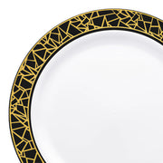 A close-up view of the White with Black and Gold Mosaic Rim Round Plastic Dinner Plate (10.25") reveals its elegant round shape and intricate mosaic-inspired black and gold pattern around the rim, adding a sophisticated touch that makes it perfect for weddings and parties.