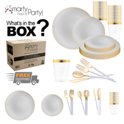 A Gray with Gold Organic Disposable Plastic Tableware Set, which includes white dinner plates with gold rims, clear cups with gold bands, and gold and white utensils, displayed alongside a cardboard box labeled "Smarty Had a Party!" and "Free Shipping." The text reads "What's in the box?