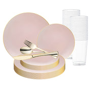 The Pink with Gold Organic Round Disposable Plastic Wedding Value Set is a neatly arranged collection of elegant items, showcasing pink dinner plates with gold rims, gold cutlery (including a fork, knife, and spoon), and a stack of clear plastic cups in the background.