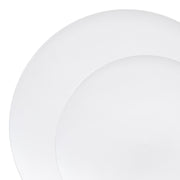 Two stacked plates from the Solid White Organic Round Disposable Plastic Dinnerware Value Set sit against a white background. The plain white plastic plates are centered, creating subtle shading around the edges where they overlap. The overall look is minimalist and clean, making it ideal for elegant event tableware.