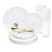 The Solid White Organic Round Disposable Plastic Wedding Value Set is perfect for hosting weddings, including stacked plates, cups, and plastic cutlery in gold. The collection features two sizes of round plates, a stack of clear plastic cups, and a knife, fork, and spoon elegantly arranged on top of the plates.