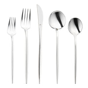 A set of five shiny metallic silver disposable plastic utensils arranged vertically. From left to right: a dessert fork, a dinner fork, a knife, a soup spoon, and a dessert spoon. Each utensil boasts a sleek, modern design that gleams with polished perfection from the Shiny Silver Moderno Disposable Plastic Cutlery Set.