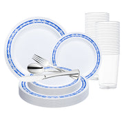 The Smarty Had A Party White with Blue and Silver Royal Rim Plastic Wedding Value Set includes a comprehensive selection of disposable tableware: large and small plates, plastic cups, and cutlery consisting of spoons, forks, and knives. This elegantly designed plastic dinnerware service for 120 features a sophisticated blue decorative border and is all neatly arranged in a display.