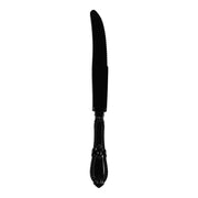 A Black Baroque Disposable Plastic Dinner Knife with an ornate handle and a slightly serrated edge is displayed against a white background.