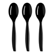 Three Black Disposable Plastic Serving Spoons are arranged in a row against a white background. The spoons, identical with rounded bowls and sleek, straight handles, highlight their versatility as serving utensils. The lighting creates a glossy reflection on each spoon, elevating the elegant table setting.