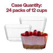 Three clear plastic dessert cups are displayed. One is filled with a layered dessert featuring a crust, pink filling, and topped with strawberries and raspberries. The text above reads "Case Quantity: 24 packs of 12 disposable 5.5 oz. Clear Fluted Rectangular Plastic Pudding Cups" in red.