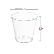 The Kaya Collection 1 oz. Clear Plastic Shot Glasses are showcased with a top dimension of 1 inch and a height of 3.5 inches, featuring a minimalist transparent design and slightly tapered shape from top to bottom—ideal for single-use at your next party.